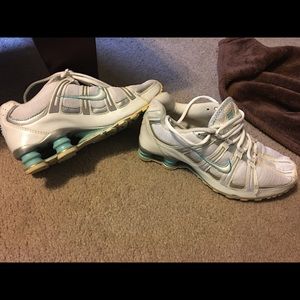 White and blue nike shox